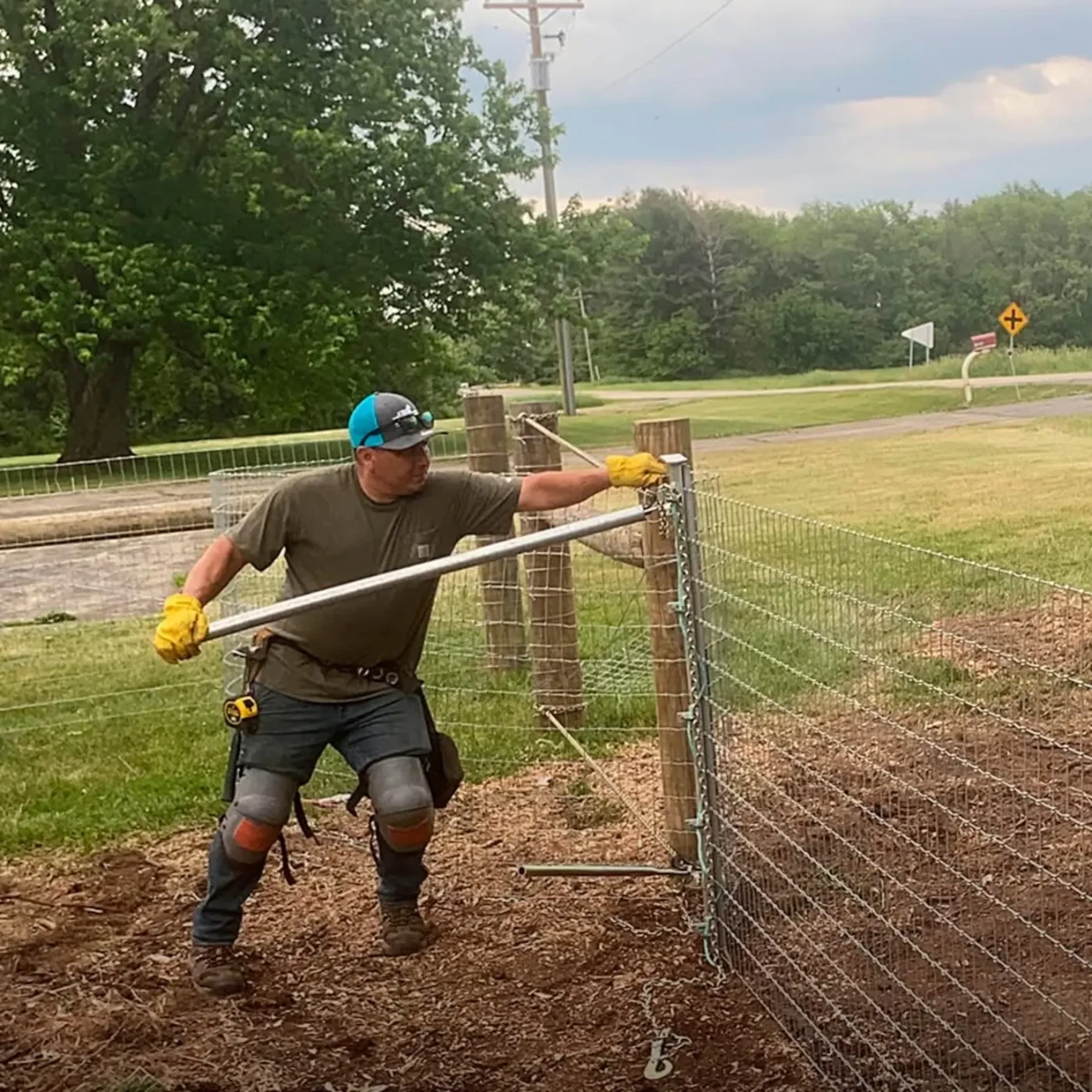 Agricultural fence installation on a Chicago-area farm property