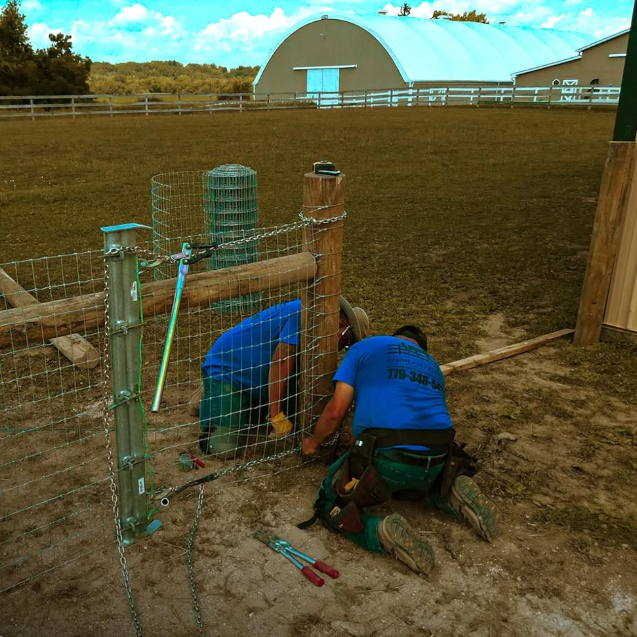 Farm fence contractor completing gate and fencing installation